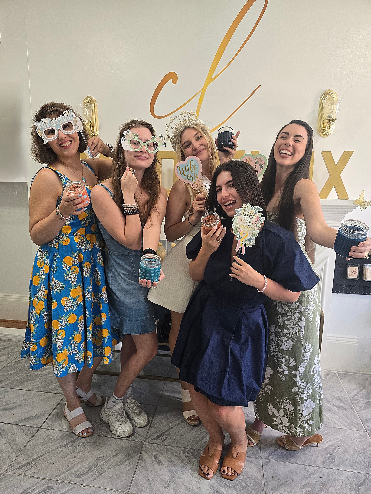 Bride-to-be and her friends celebrating with a fun bachelorette candle-making party at CandleLux Candle Bar on Newbury Street in Boston.
