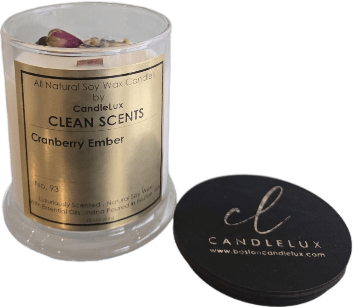 Picture of soy wax candle in a clear glass round vessel with a CandleLux Clean Scents Cranberry Ember gold foil label on the front.