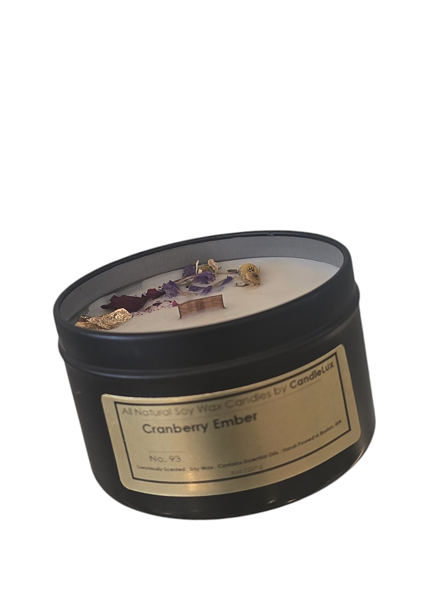 Picture of soy wax candle in a black travel tin with a CandleLux Clean Scents Cranberry Ember gold foil label on the front.