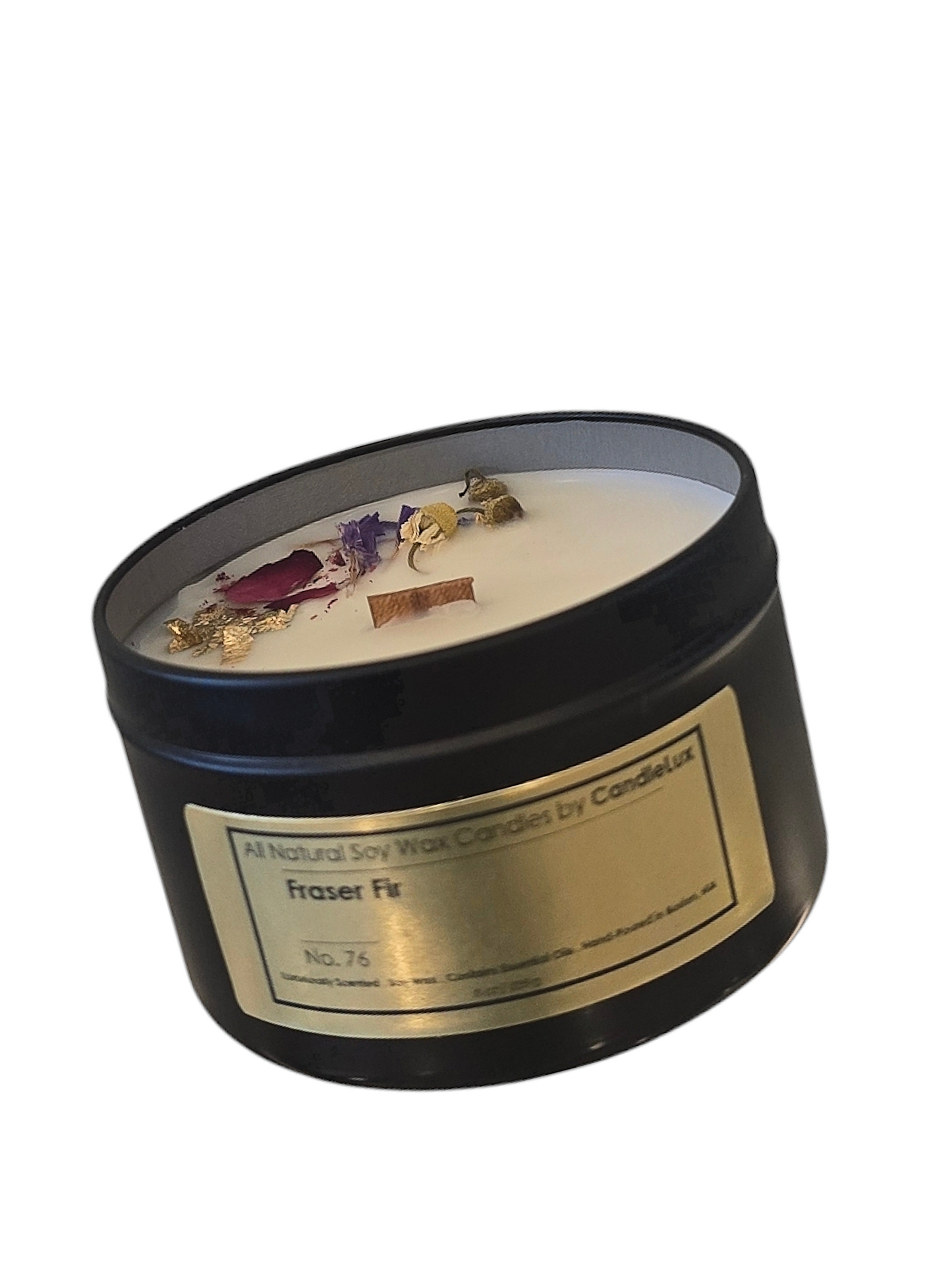 Picture of soy wax candle in a black travel tin with a CandleLux Clean Scents Fraser Fir gold foil label on the front.