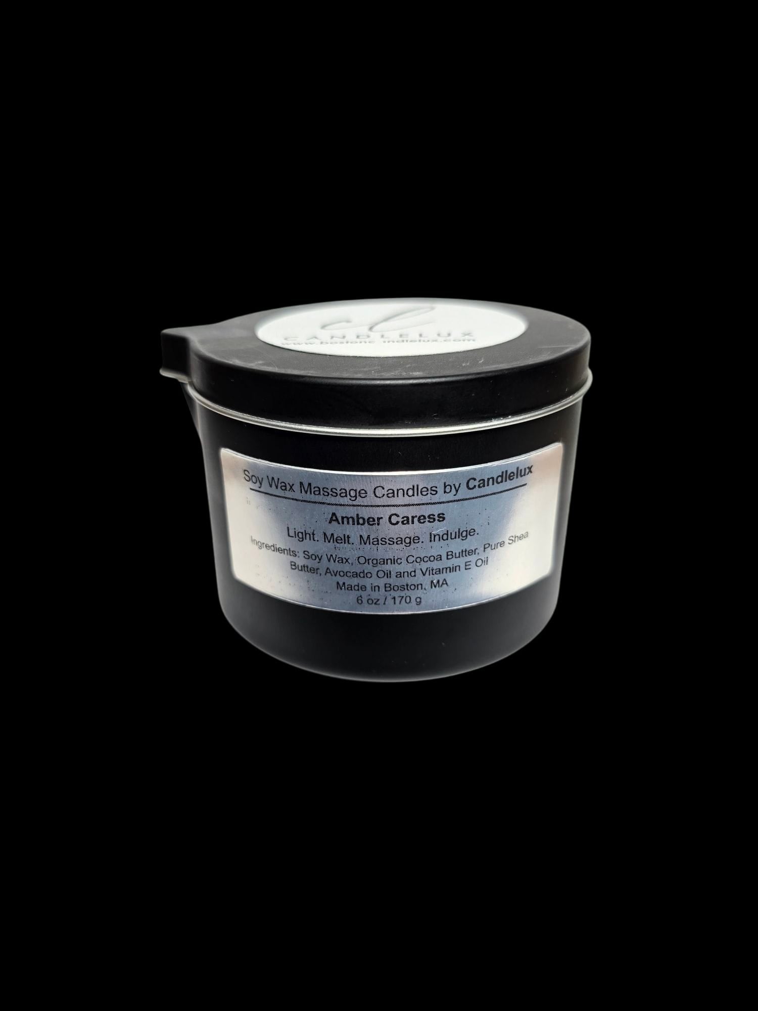 6oz CandleLux Amber Caress luxury massage candle in a black travel candle tin with pour spout.