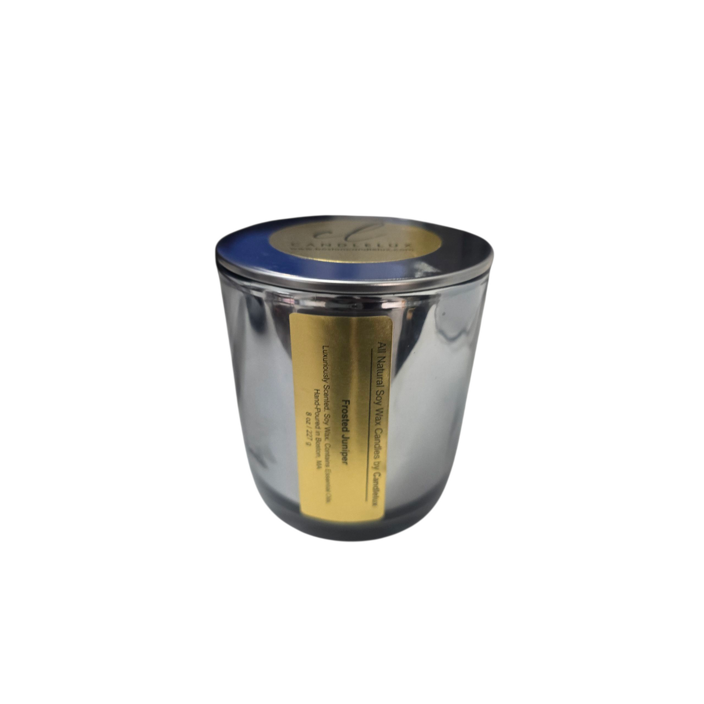 Frosted Juniper candle in a mirrored silver vessel with a gold label by CandleLux on a white background.